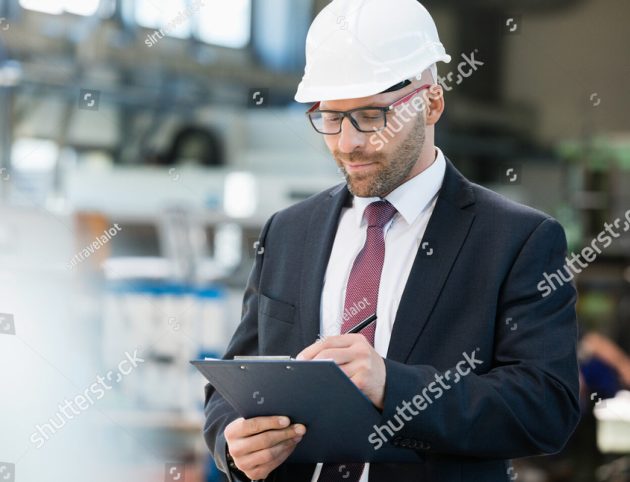 stock-photo-mid-adult-businessman-writing-on-clipboard-in-metal-industry-517257973 stock-photo-mid-adult-businessman-writing-on-clipboard-in-metal-industry-517257973